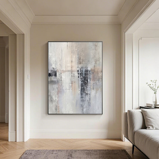 Beige and gray abstract canvas painting above fireplace