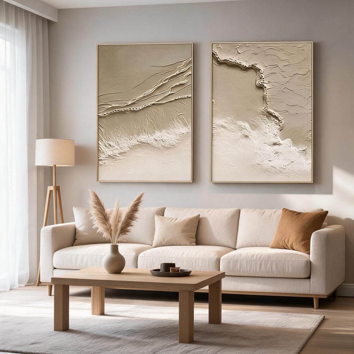 Set of two minimalist coastal canvas artworks in beige tones