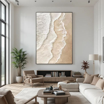 Neutral coastal canvas art featuring an aerial ocean wave design